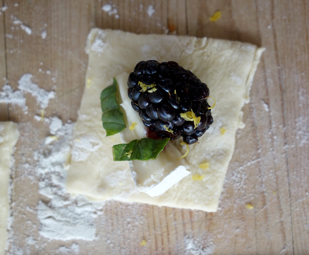 Filling puff pastry with basil and cheese