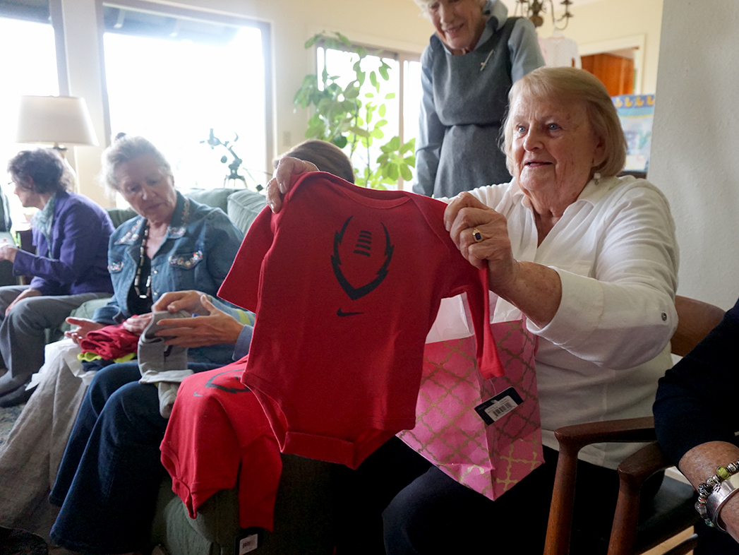Rotate opening baby shower presents